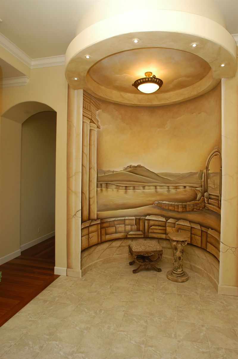 Domed niche with a painted landscape mural and inlaid stone floor